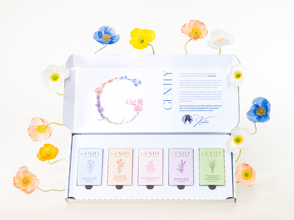 Our Live Gently gift set open for display with colorful florals stemming out from around it