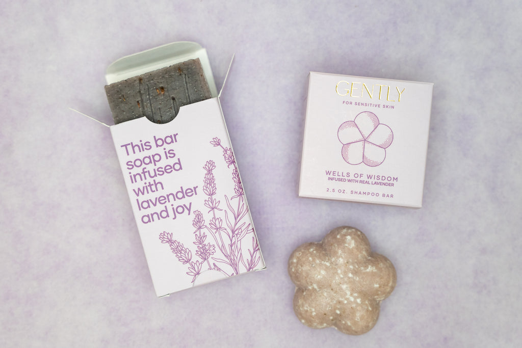 Bar of soap with packaging on a gray background