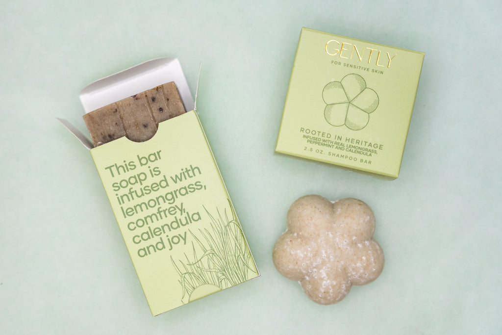 Bar of soap with packaging on a light green background